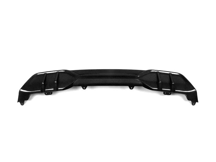 A front view of AUTOTECKNIC DRY CARBON PERFORMANTE REAR DIFFUSER - BMW G05 X5 2019+ with white background