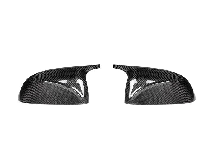 A front view of AUTOTECKNIC M-INSPIRED DRY CARBON MIRROR COVERS - BMW G01 X3 | G02 X4 | G05 X5 | G06 X6 | G07 X7 2017+ with white background