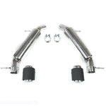 Top-down view of the full Fabspeed Supercup Exhaust System including two stainless steel muffler sections, two mounting clamps, and two carbon fiber exhaust tips laid out on a white background.