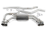 A studio product shot on a white background showing the complete Dinan Valved Cat-Back Exhaust System for the BMW X3 M40i. The system is laid out to show the brushed T304 stainless steel construction, featuring a large single mid-pipe that connects to a rear muffler with quad exhaust tips.