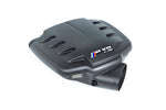 Black carbon fiber inlet plenum with angular design, air vents on top, and cylindrical outlet tube - Eventuri inlet plenum for BMW M3
