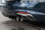 Close-up of Capristo carbon twin tips in diffuser of dark blue Audi RS5 coupe