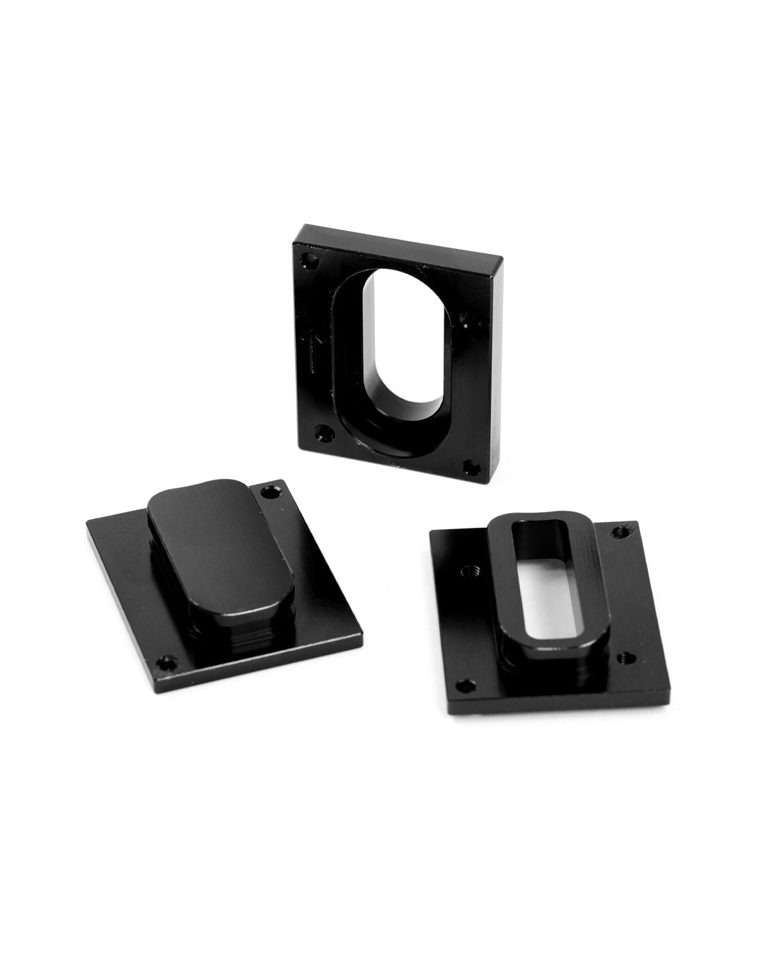 Three black intake MAF sensor adapter plates
