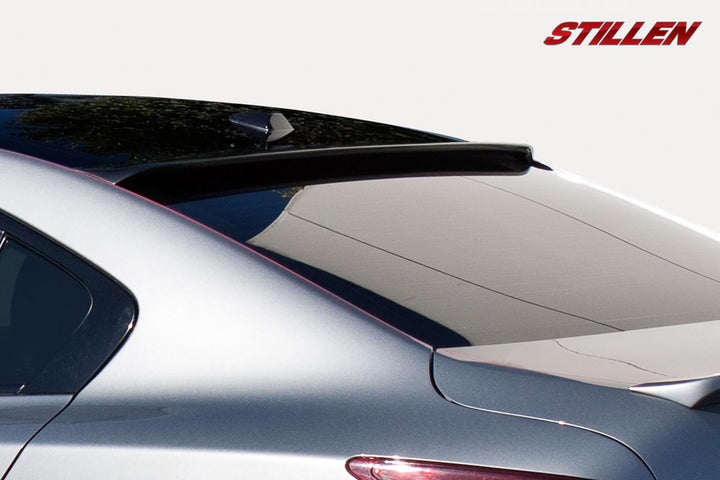 close view of Stillen Roof Wings, Roof Spoilers, & Body Kits for Nissan Maxima 2009-2015 fitted inside a car