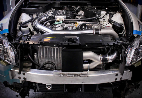 wide view of Stillen Transmission Cooler Kit for Nissan 370Z [Z34] / Infiniti G37, Q40, Q50, Q60 2008-2015 fitted inside a car