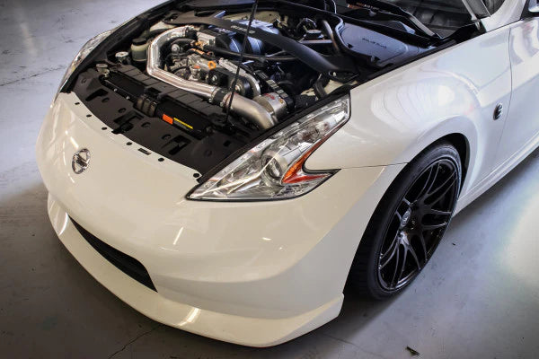 wide view of Stillen Supercharger - Tuner Kit [Polished] for Nissan 370Z [Z34] Nismo 2012-2014 fitted inside a car