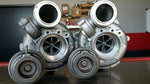 A front view of Pure Turbos BMW N63/N63tu Stage 1 Upgrade Turbos on a table