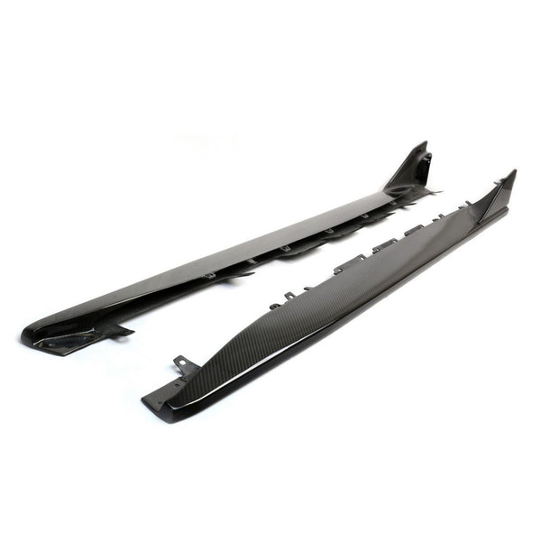 A front view of APR Performance Carbon Fiber Side Rocker Extensions Toyota Supra A90/91 2020-2023 with white background