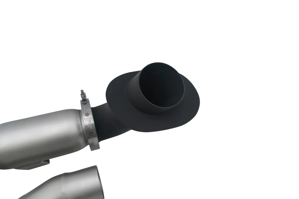 A close up view of the tip of Soul Performance X-Pipe Exhaust System | Porsche 992.2 Carrera (Base / T / S) 2025+ with white background