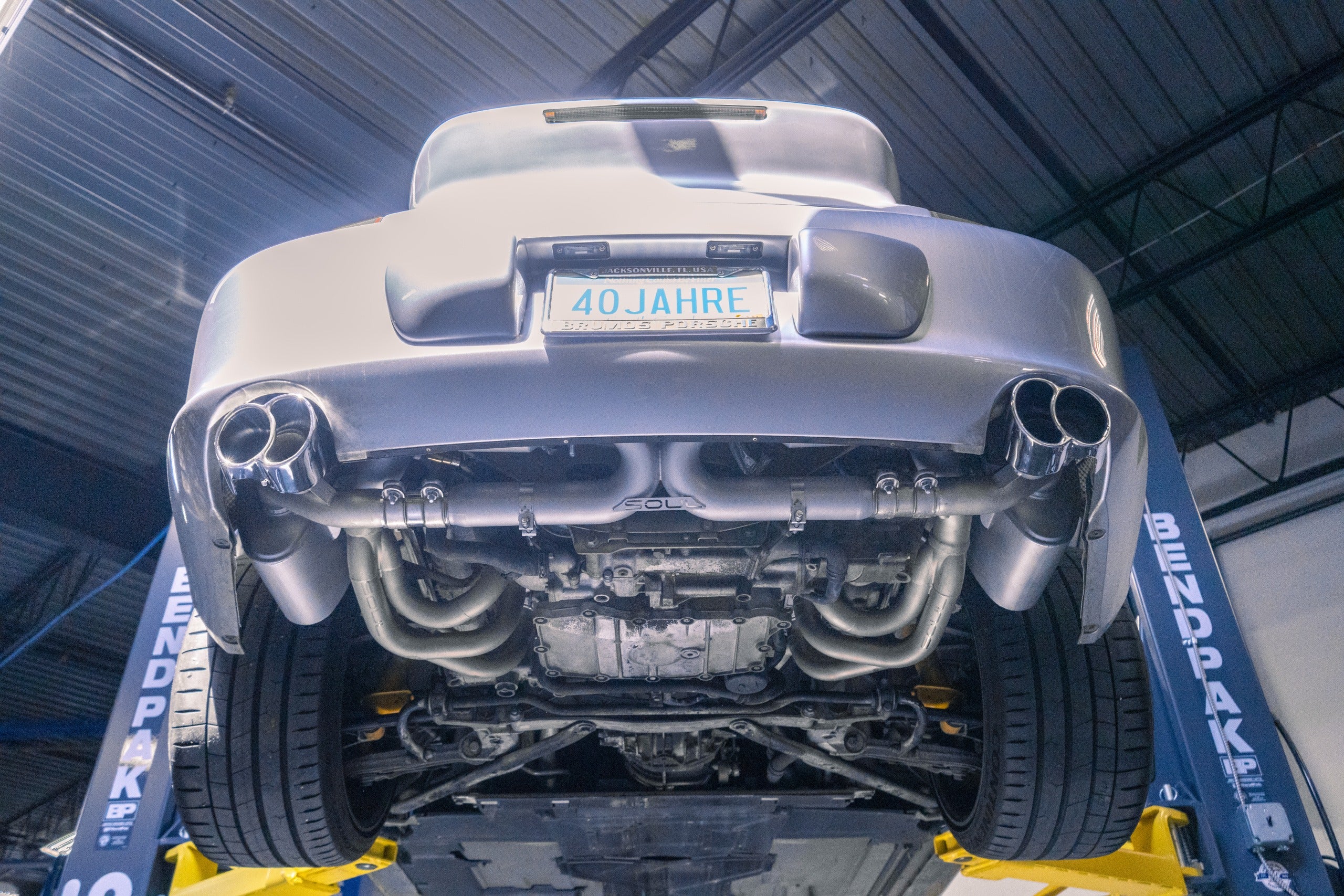 Soul 996 Carrera x-pipe: X-pipe installed under a 996 on a lift