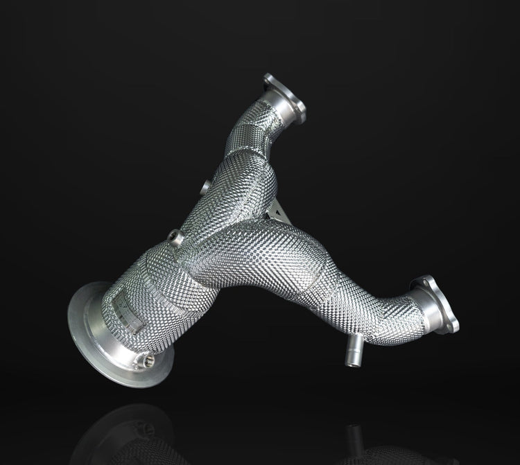 A front wide view of IPE SS Catless Downpipe for Audi S4 B9 / S5 F5 2017-2025 with black background