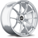 Silver alloy wheel with split-spoke design, machined finish, and black center cap with logo engraving - APEX Wheels wheel for 20x12.5 ET55 5x120.65 - Brushed Clear