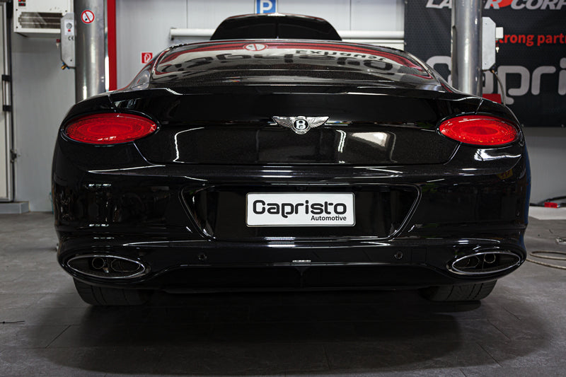 Black Bentley Continental GT V8 rear view with the Capristo valved exhaust behind the factory oval tips