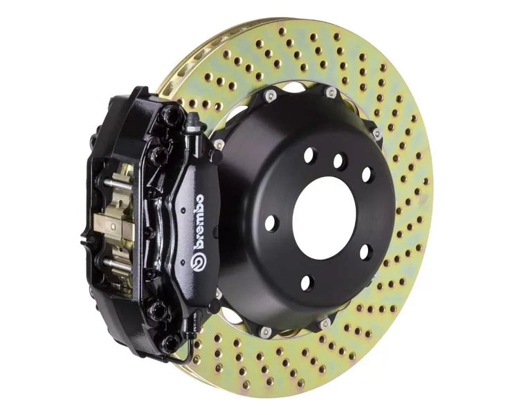 A front view of Brembo GT Rear Big Brake Kit 345x28 2-Piece 4-Piston Drilled Rotors for Dodge / Chrysler 2005-2023 with black caliper with white background