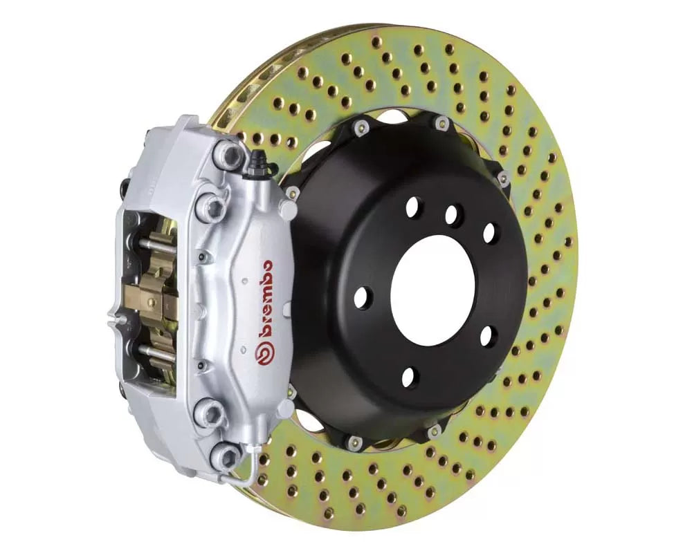 A front view of Brembo GT Rear Big Brake Kit 345x28 2-Piece 4-Piston Drilled Rotors for Dodge / Chrysler 2005-2023 with silver caliper with white background