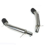 Perspective view of the two stainless steel Fabspeed exhaust muffler sections with carbon fiber tips attached, showing the mounting hangers and curved piping.