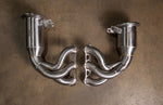 Valvetronic Designs 400-cell catted downpipes for Porsche 992 GT3 and GT3 RS, polished stainless steel.