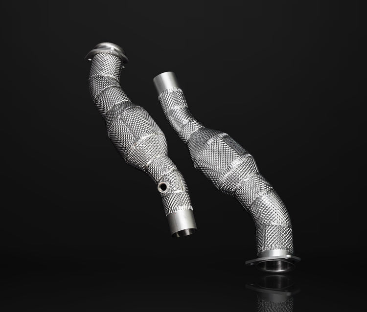 A front wide view of IPE SS Catted Downpipe for Ferrari F430 / F430 Spider 2004-2009 with black background