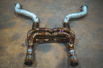The titanium exhaust system shown with two additional heat-shielded front pipes.