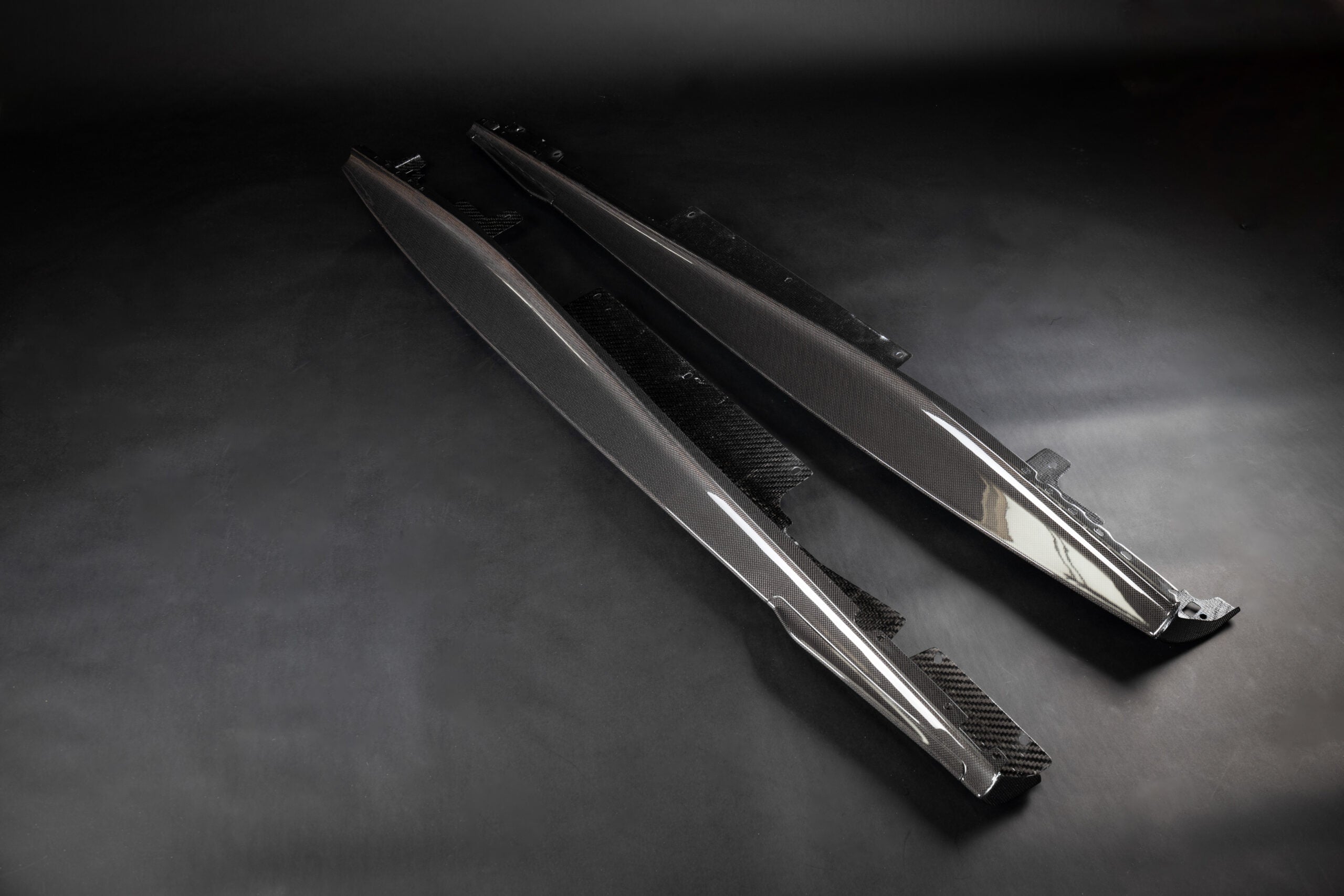 Pair of Capristo carbon fiber side skirts with small fin for Ferrari Roma
