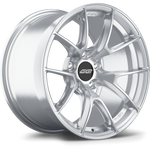Silver alloy wheel with ten-spoke Y-shaped design featuring brushed metallic finish and black center cap with visible bolt holes - APEX Wheels wheel for 20x9.5 ET44 PSCL - Brushed Clear