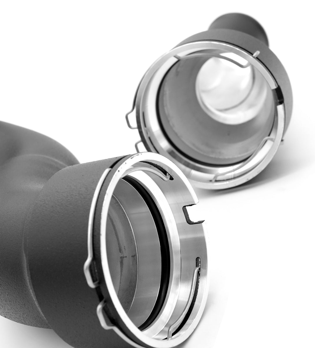 Close-up of circular charge pipe connection adapters