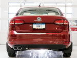 Rear view of a red Mk6 Jetta 1.4T with the AWE Touring Edition and twin Chrome Silver tips