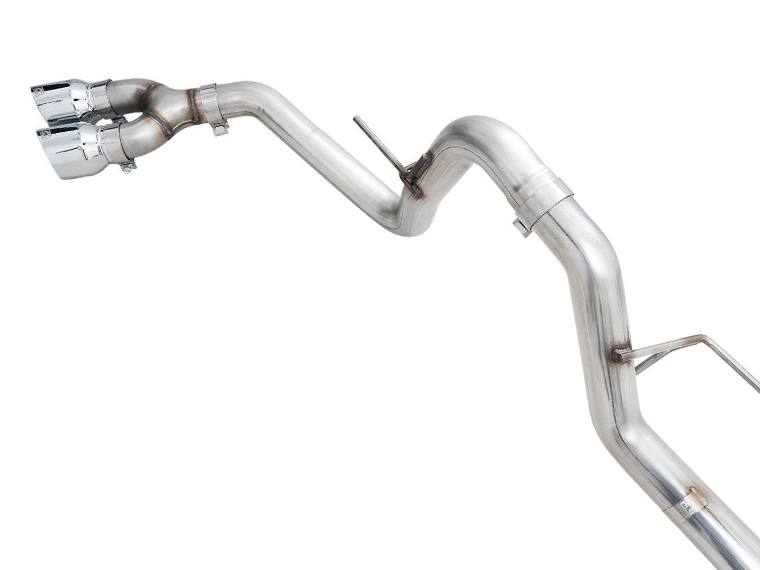 Side angle of the AWE 0FG F-150 side exit system showing the bends ahead of the rear axle