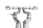 Close look at the AWE Track Edition crossover joint and hangers above the twin mid pipes