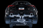 Black A90 GR Supra rear on a black backdrop showing the AWE Track system under the car