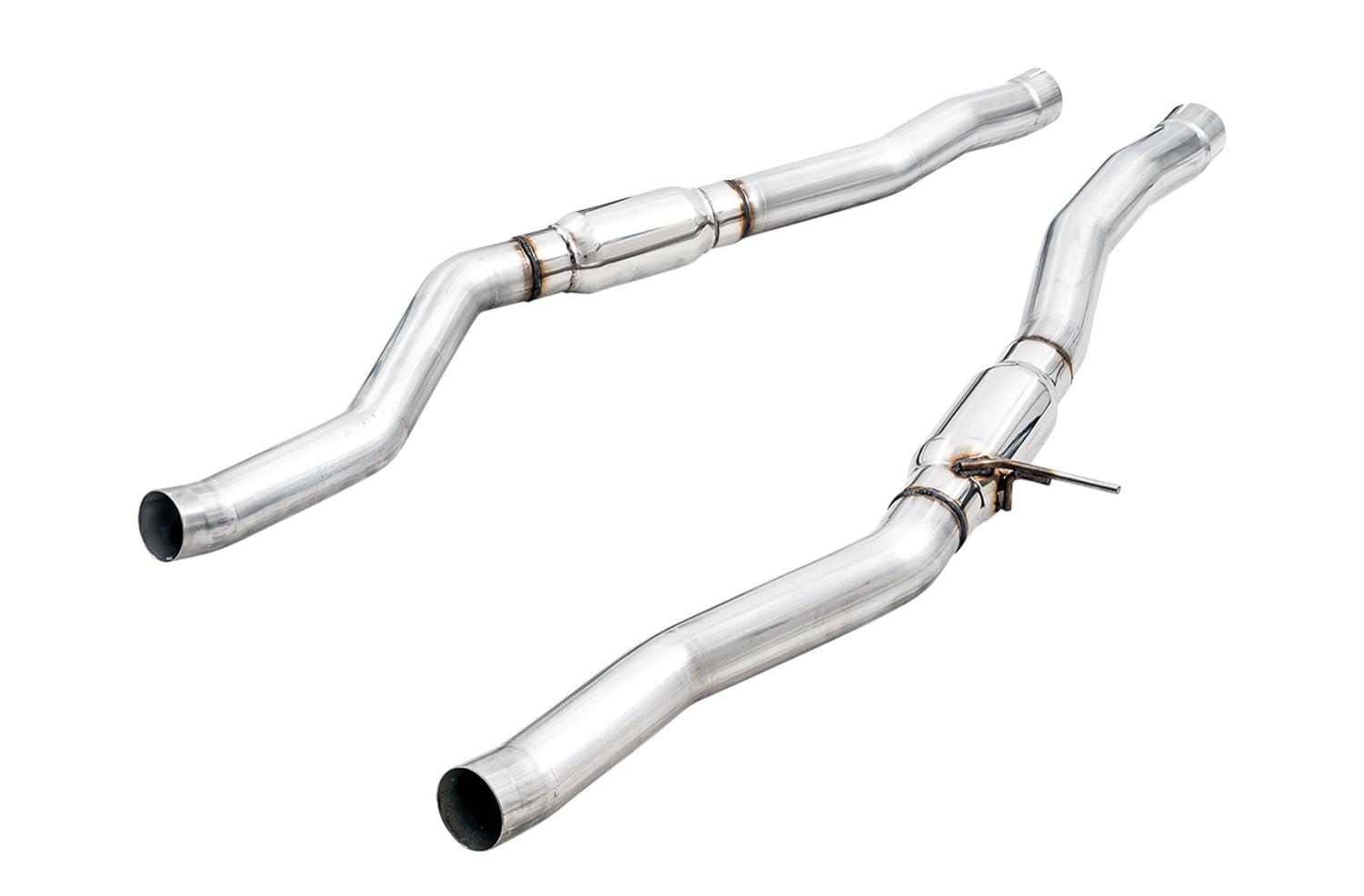 AWE resonated mid pipes for the A90 Supra on white, each with an inline bullet resonator