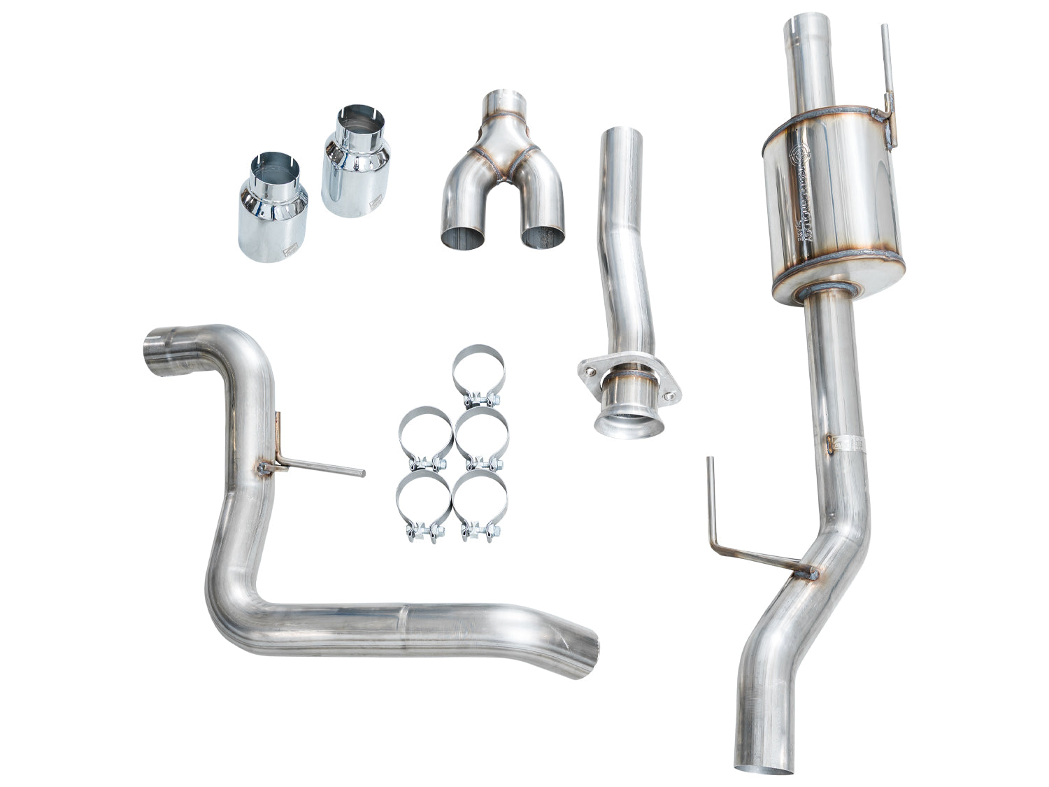 AWE Regular Cab 0FG kit parts laid out: pipes, muffler, Y-piece, clamps and Chrome tips