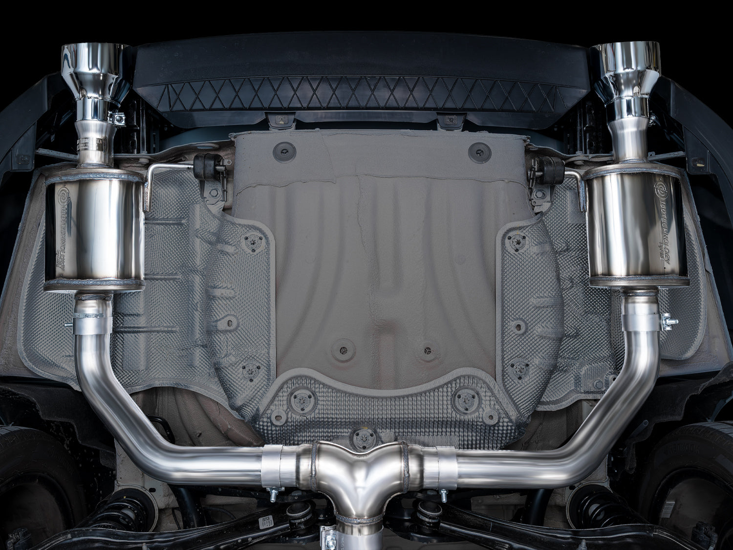 Underside view of the AWE Touring Edition rear mufflers and T-merge fitted to the GLI