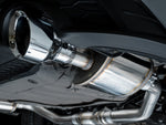 Close-up of a 5-inch Chrome Silver AWE slash-cut tip under the GLI rear bumper