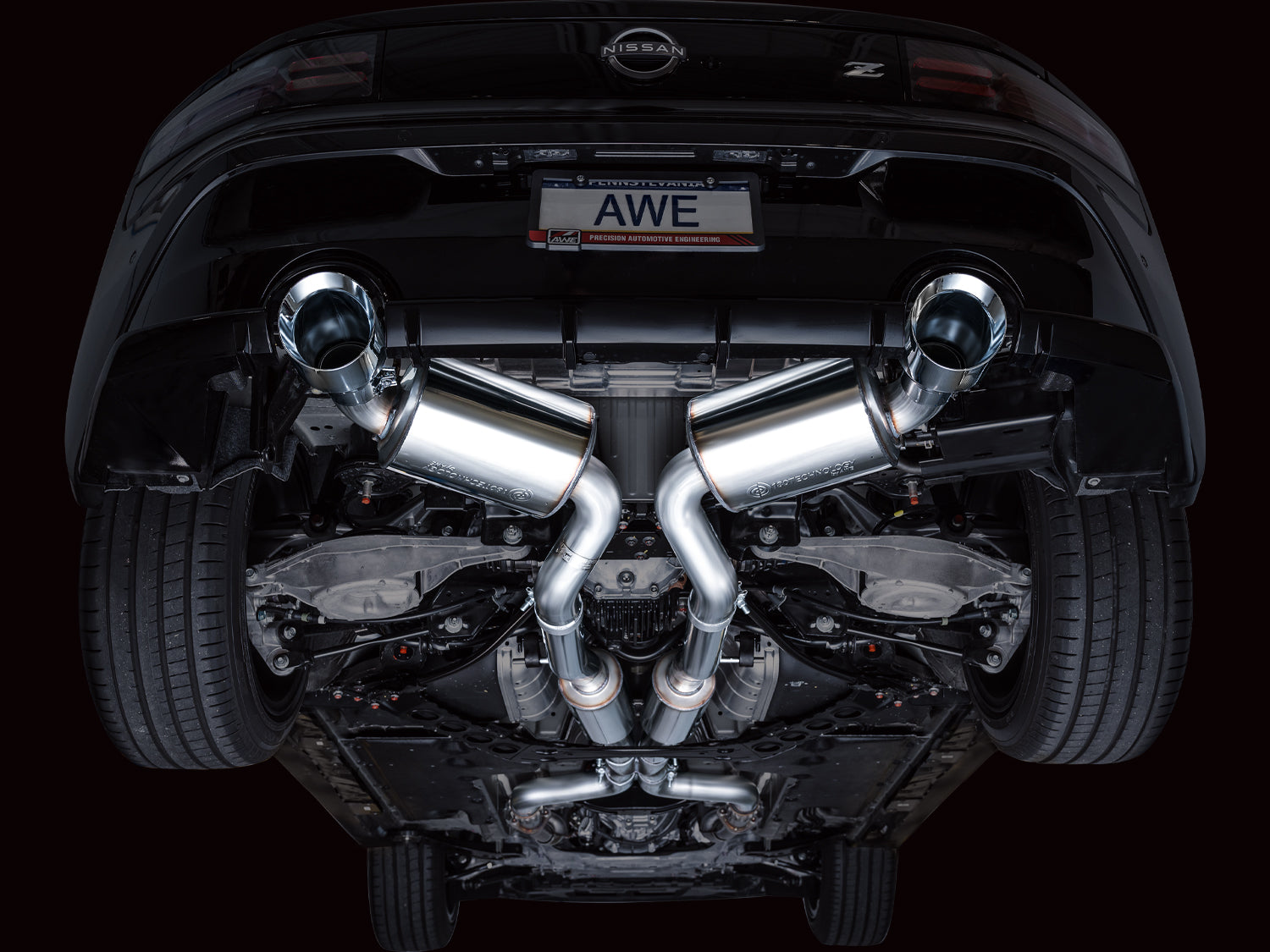 Under a black Nissan Z from the rear: AWE Touring X-pipe and resonators fitted