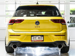 Rear view of a yellow Mk8 GTI in a studio with AWE 5-inch Chrome Silver tips