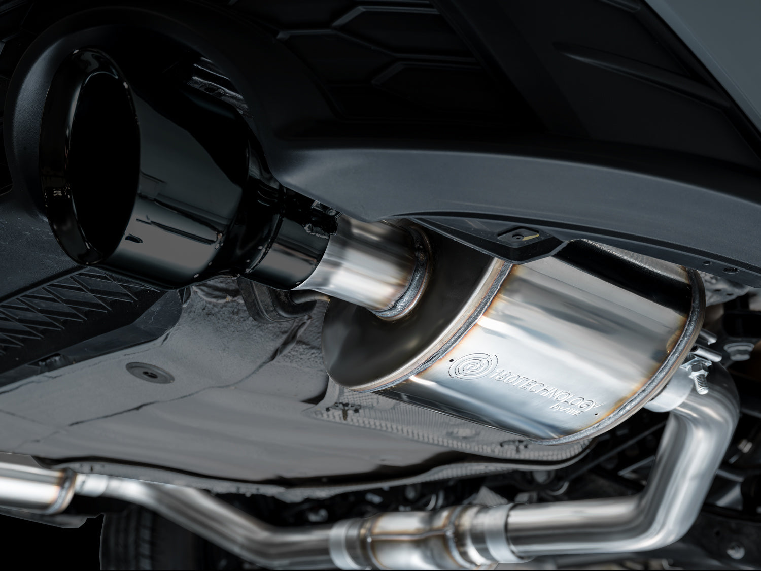 Close-up of a 5-inch Diamond Black AWE slash-cut tip on the Touring Edition GLI