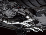 Angled underbody shot of the full AWE Touring system running the length of a Nissan Z