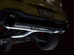Close-up of the AWE Touring Edition rear section and tips under the GTI bumper