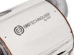 Close-up of the 180 Technology by AWE logo etched on a polished Touring muffler case