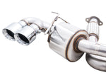 Close-up of an AWE 180 Technology muffler and twin chrome tips on the C8 Touring Edition