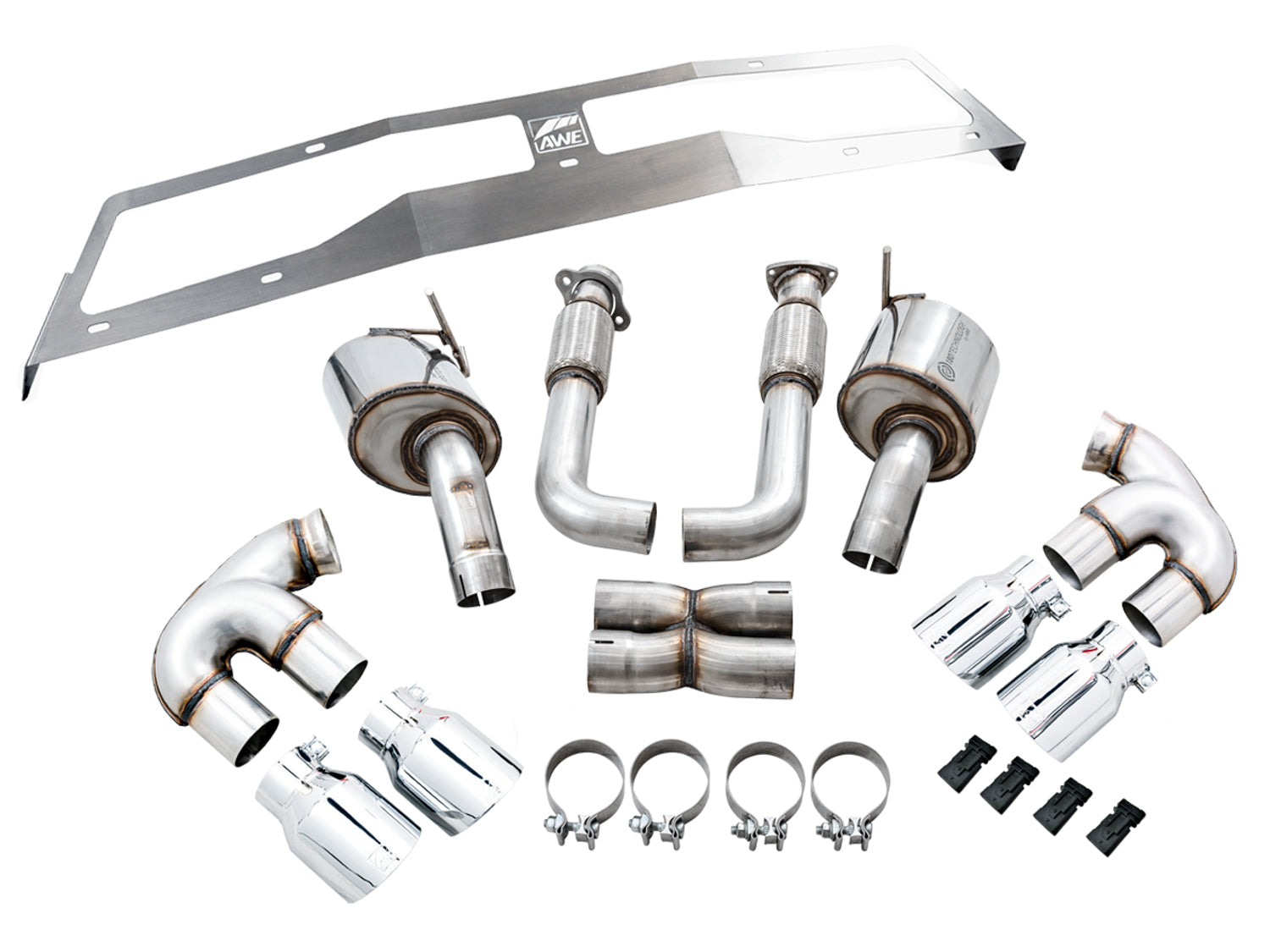 Everything in the AWE C8 Touring box laid out: pipes, mufflers, tips, heat shield and clamps