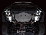 Underside view of the AWE Touring axle-back installed on a VB WRX behind the factory mid-pipe