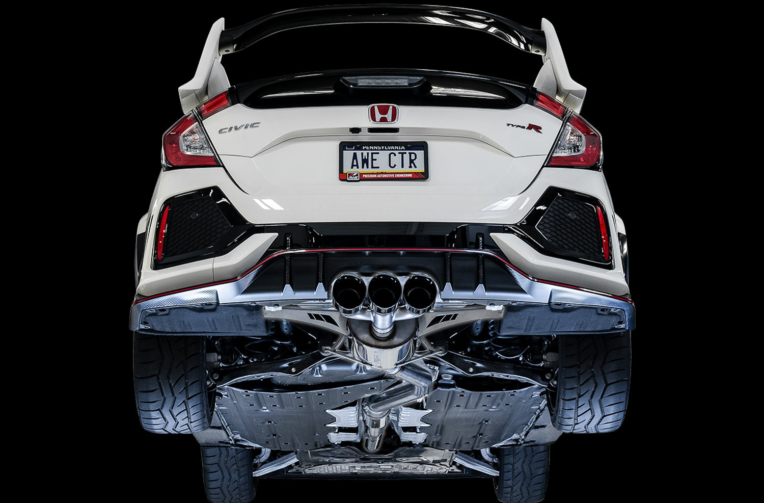 Lifted white FK8 Type R from behind showing the AWE Touring system and black tips