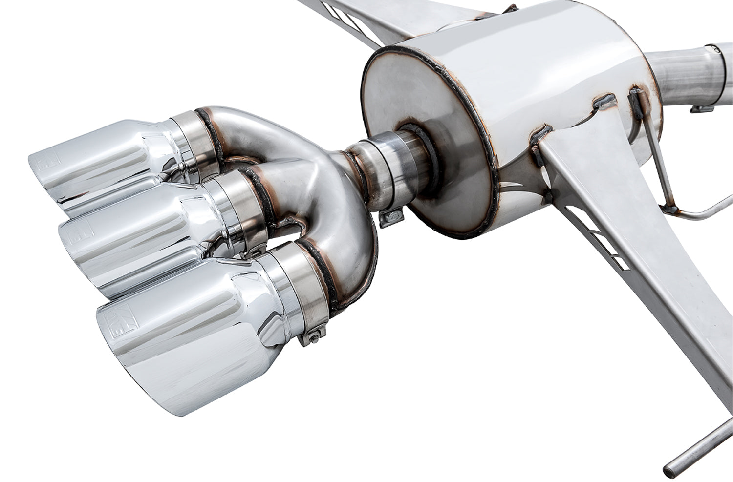 Close angle on the AWE trident merge and chrome slash-cut tips leaving the FK8 muffler