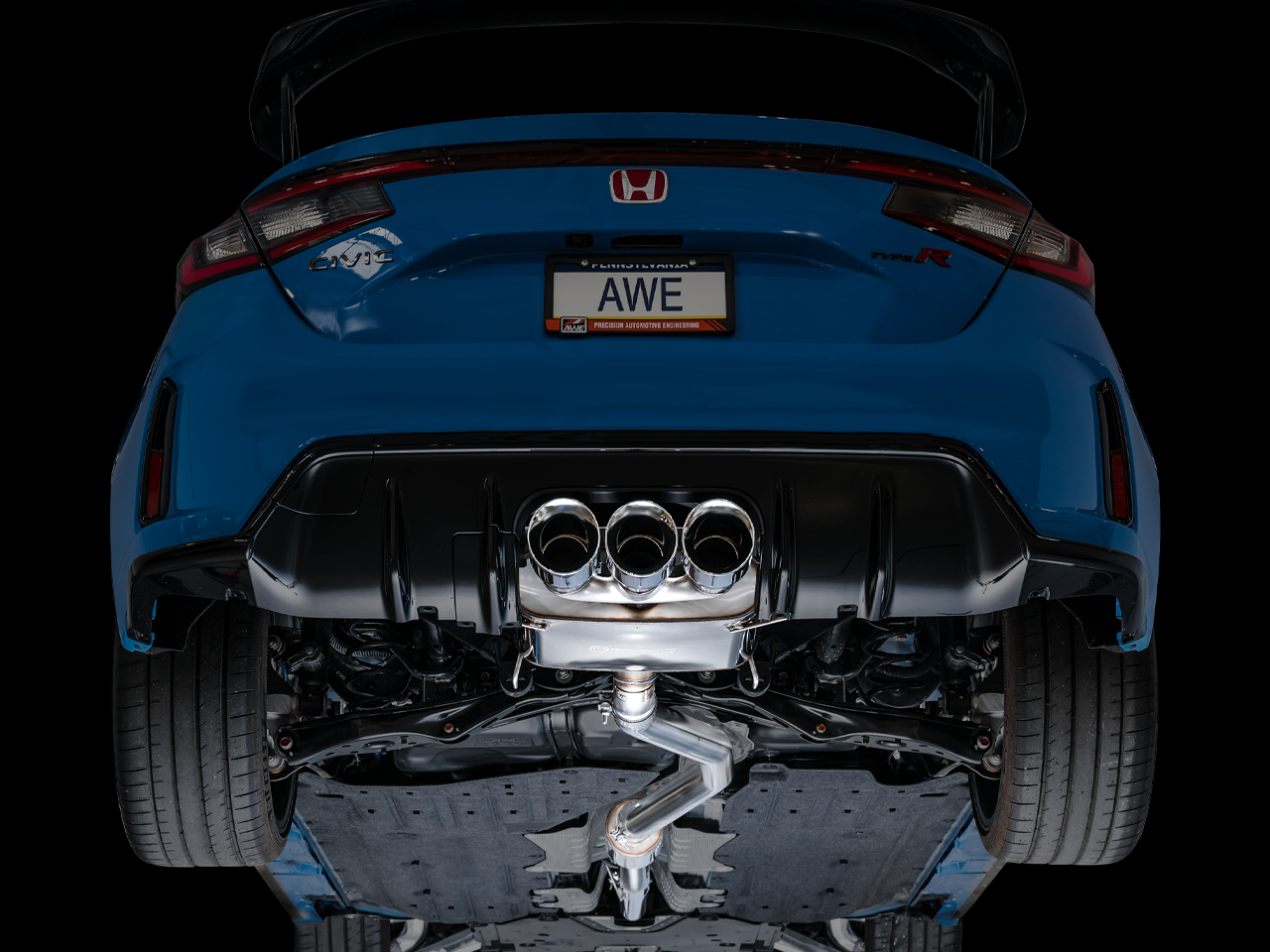Blue Civic Type R from below the bumper with the AWE Touring muffler and chrome tips fitted