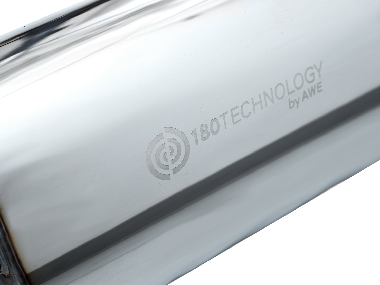 Close-up of the 180 Technology logo stamped on the AWE GR Corolla Touring muffler