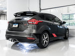 Gray Mk3 Focus ST in a white garage, rear three-quarter view with the AWE Touring exhaust