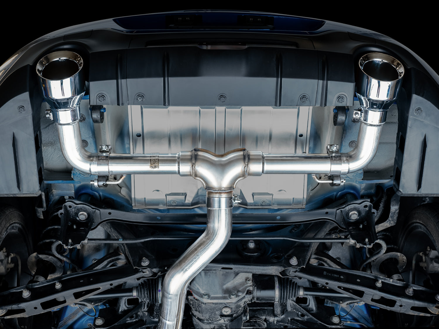 AWE Track Edition exhaust for Toyota GR86, underside view of the installed system with Chrome Silver tips
