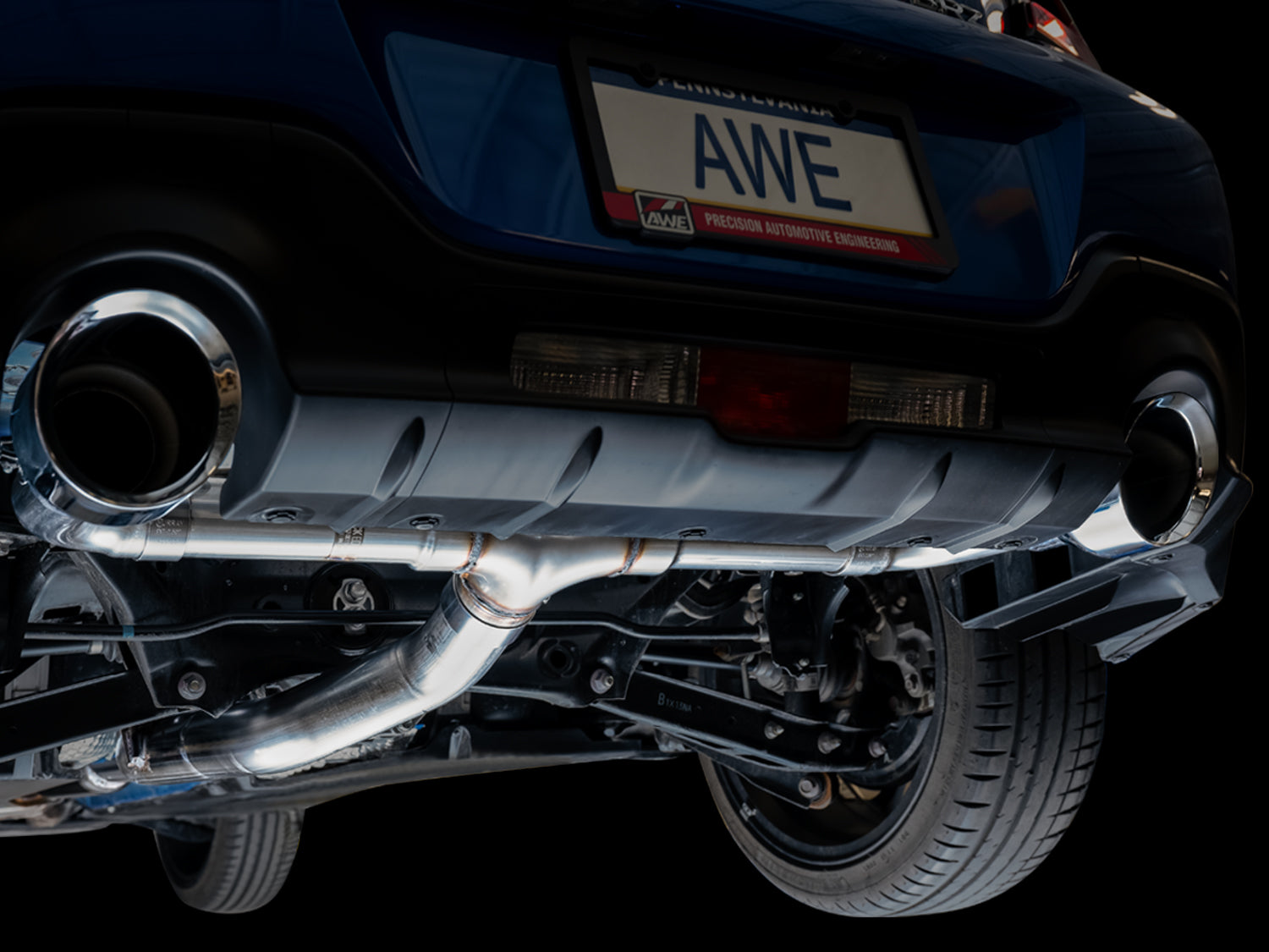 AWE Track Edition exhaust for Toyota GR86, close-up of a 5-inch Chrome Silver tip below the rear bumper